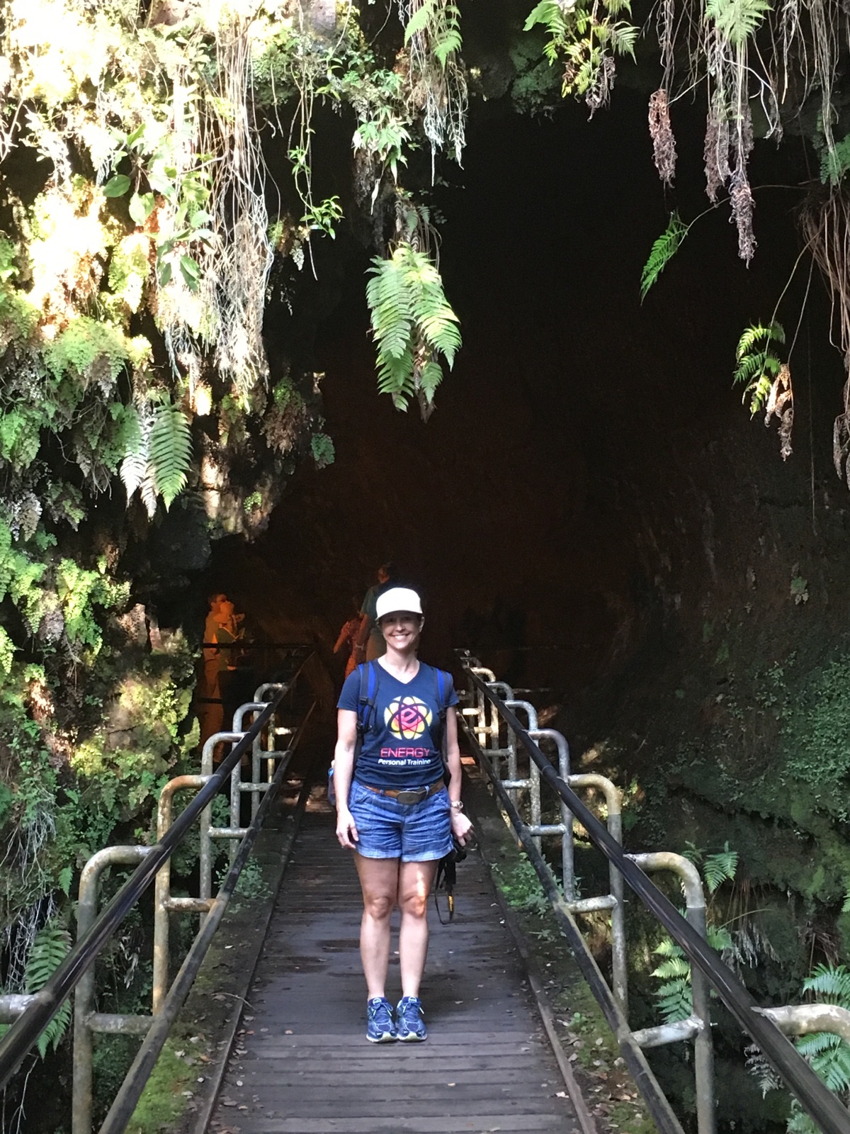 Jodi exploring underground volcanic caves, Hawaii.